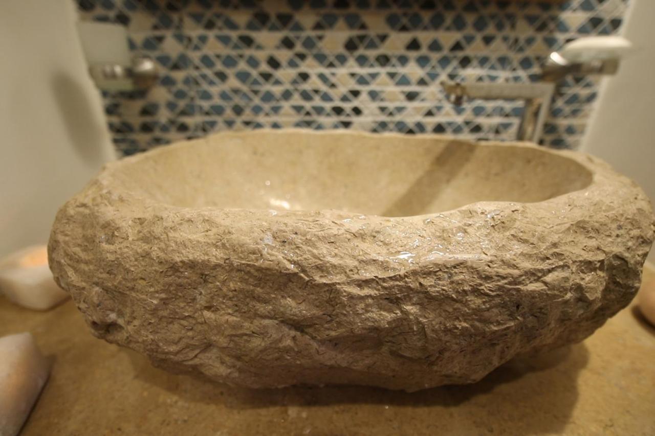 Benben By Dhara Hotels - Adults Only Асуан Екстериор снимка A stone sink