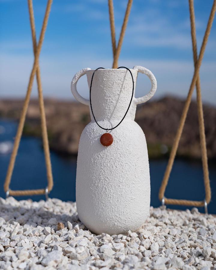 Benben By Dhara Hotels - Adults Only Асуан Екстериор снимка A necklace with a pendant