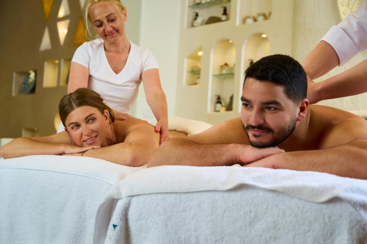 Benben By Dhara Hotels - Adults Only Асуан Екстериор снимка Massage therapists working on a couple