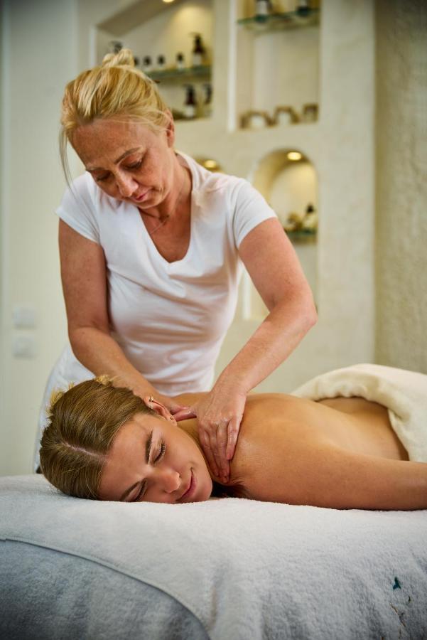 Benben By Dhara Hotels - Adults Only Асуан Екстериор снимка A massage therapist treating a patient